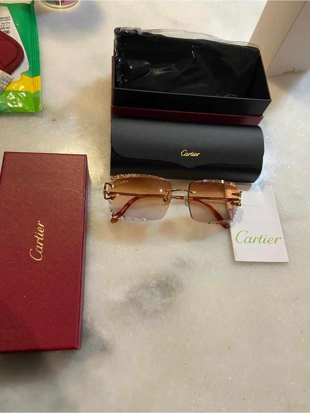 Cartier Rimless Sunglasses in Gold with Amber/Brown Lenses